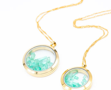 Necklace with large chest pendant with natural emeralds