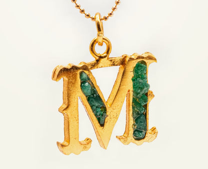 Letter pendant with resin-coated emerald chain coin